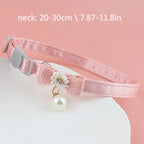 Pink Bell, Bow, and Pearl Cat Collar